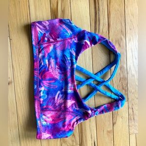 A colorful sports bra. The brand is ivivva, it’s a 14, more like a teens bra.